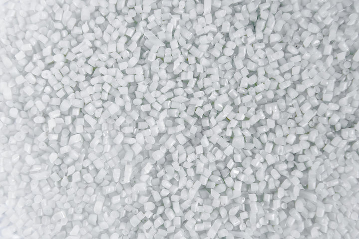 Polypropylene granule close-up background texture