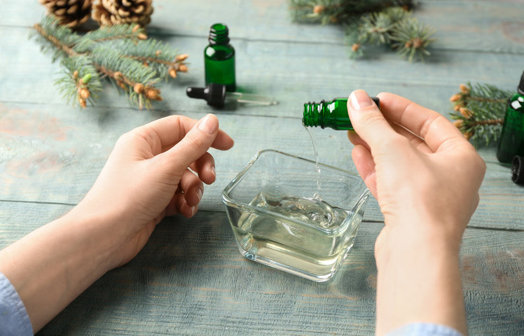 pouring essential oil 